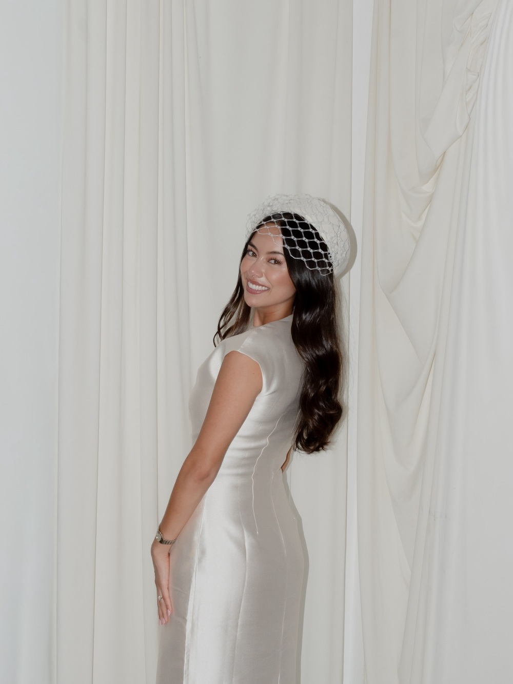 Cream Pillbox Hat with Decorative Net Veil